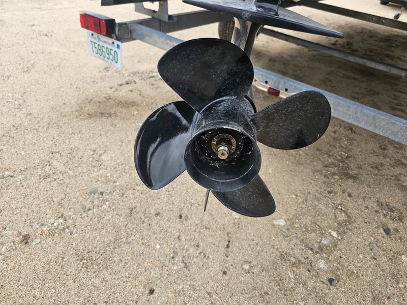 Slide: The Image of Black propeller of a 2020 Bennington 20SV boat on a trailer. - 17