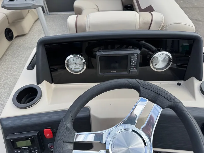 Slide: The Image of Dashboard of 2026 Bennington 22SSR-SPS (PB) with steering wheel and gauges. - 16