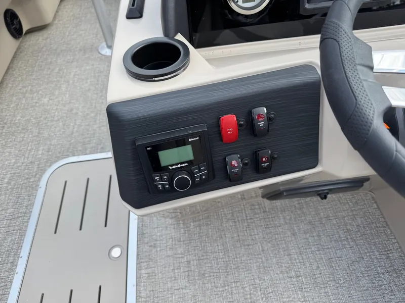 Slide: The Image of Dashboard of 2026 Bennington 22SSR-SPS (PB) with controls and radio. - 17