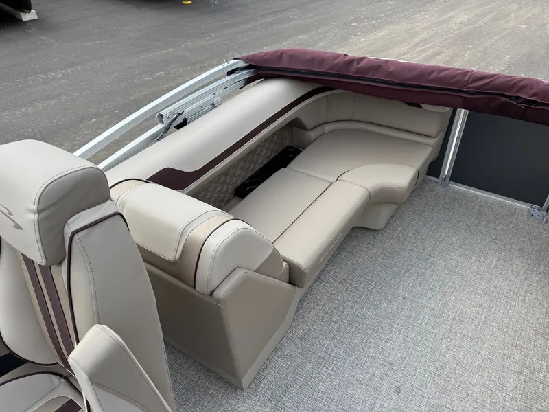 Slide: The Image of Interior of 2026 Bennington 22SSR-SPS (PB) with beige leather seating. - 21