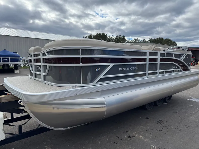 Slide: The Image of 2026 Bennington 22SSR-SPS pontoon boat on a trailer. - 3