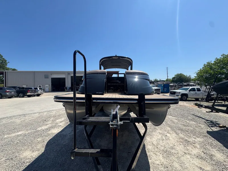 Slide: The Image of 2017 Bennington 25QXCWIO pontoon boat on trailer outdoors. - 3