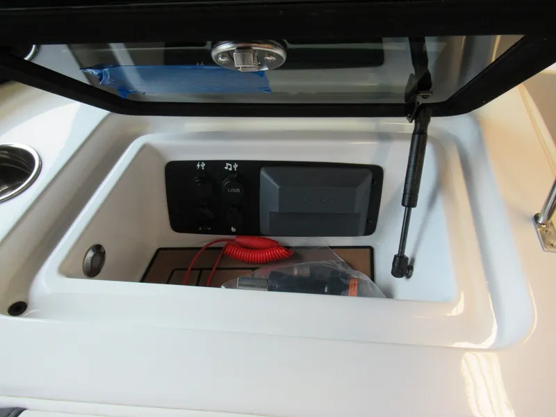 Slide: The Image of 2019 Nautique 200 boat console with USB port. - 19