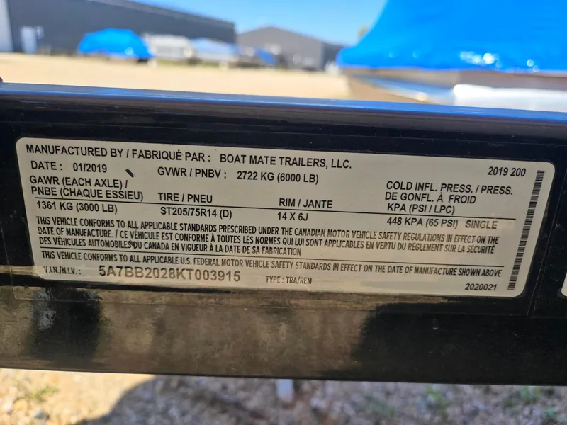 Slide: The Image of Nautique 200 2019 trailer label with technical specifications. - 22