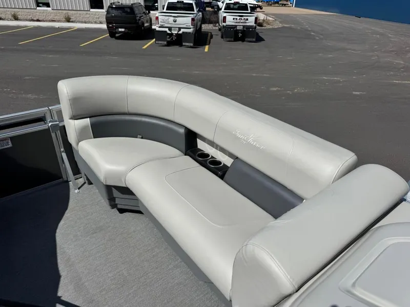 Slide: The Image of SunCatcher Vista 16 boat seating, 2021 model, in parking lot. - 8