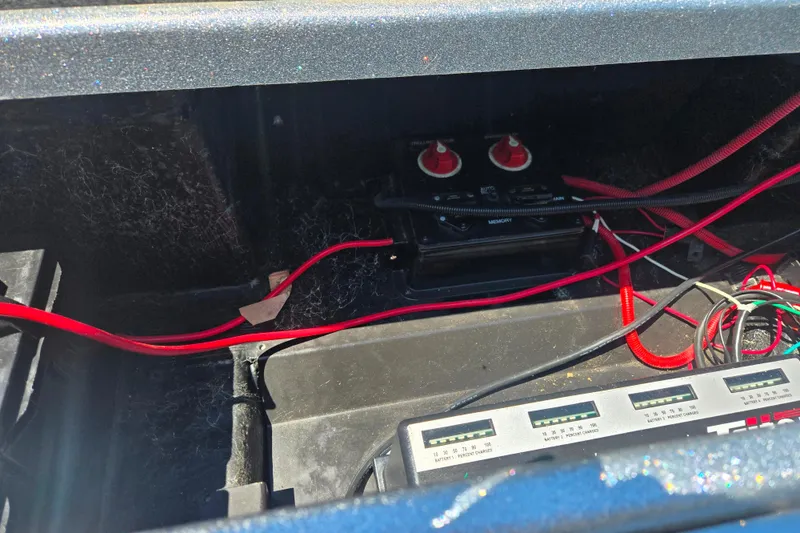Slide: The Image of Electrical wiring and battery setup in a 2011 Triton 20XS DC boat. - 4