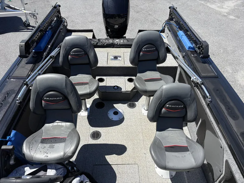 Slide: The Image of Interior of a 2022 Tracker Targa V19 boat with four seats. - 7