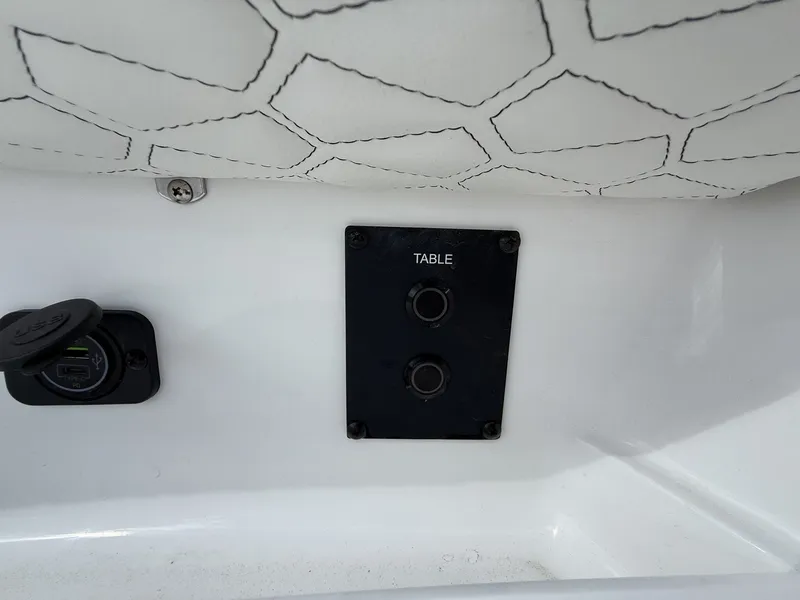 Slide: The Image of Tidewater 272 CC Adventure 2026, table control and USB port. - 10