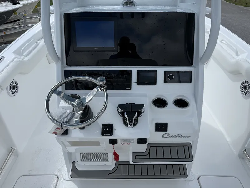 Slide: The Image of 2026 Tidewater 272 CC Adventure helm console. - 14