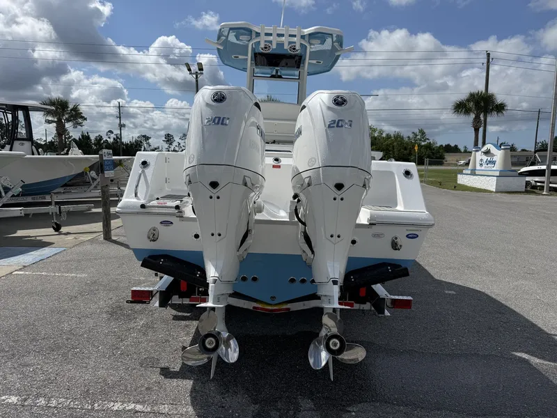 Slide: The Image of 2026 Tidewater 272 CC Adventure with dual outboard engines. - 3