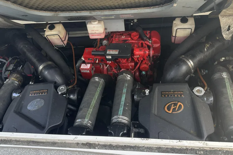 Slide: The Image of Engine compartment of a 2001 Sea Ray Sundancer 310, featuring Horizon MerCruiser components. - 14