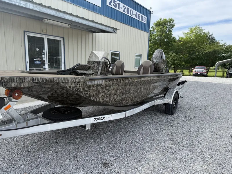 Slide: The Image of Thor Lake Hammer 1900 SC 140HP boat on trailer, 2026 model. - 2