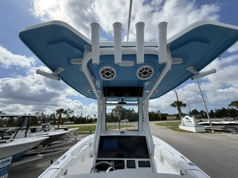 Slide: The Image of Tidewater 272 CC Adventure 2026 with blue canopy and modern features. - 15