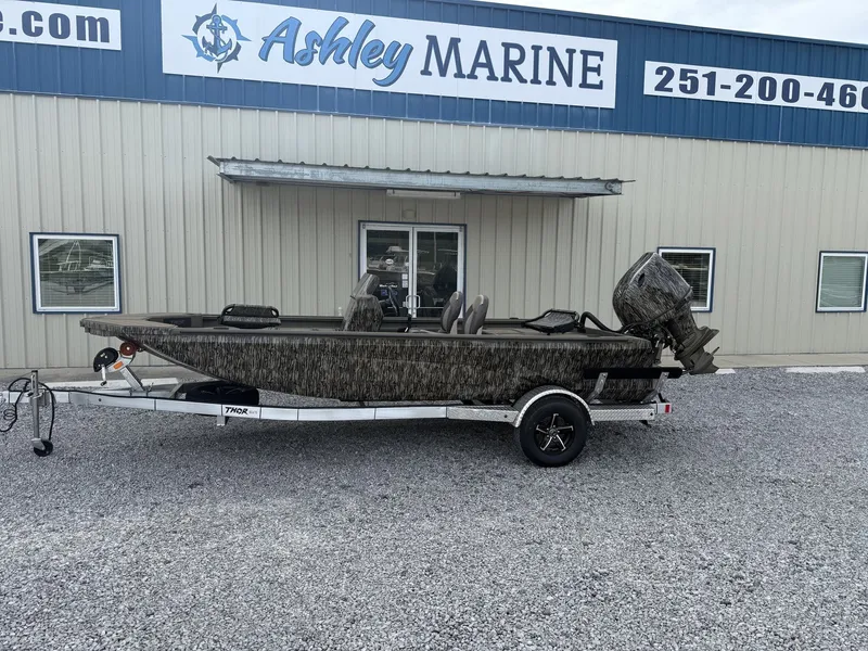 The Image of Thor Lake Hammer 1900 SC 140HP boat outside Ashley Marine building. - 1