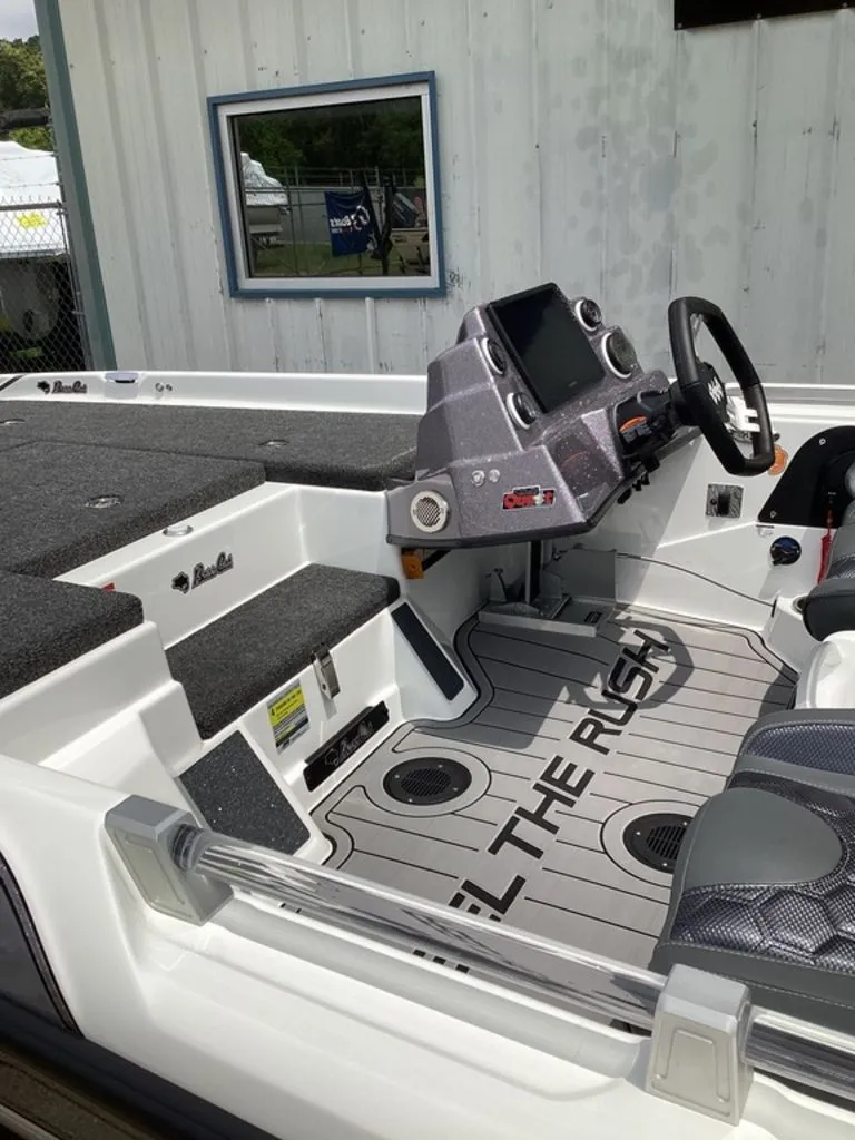 Slide: The Image of Interior of 2026 Bass Cat Cougar FTD with modern helm console. - 14