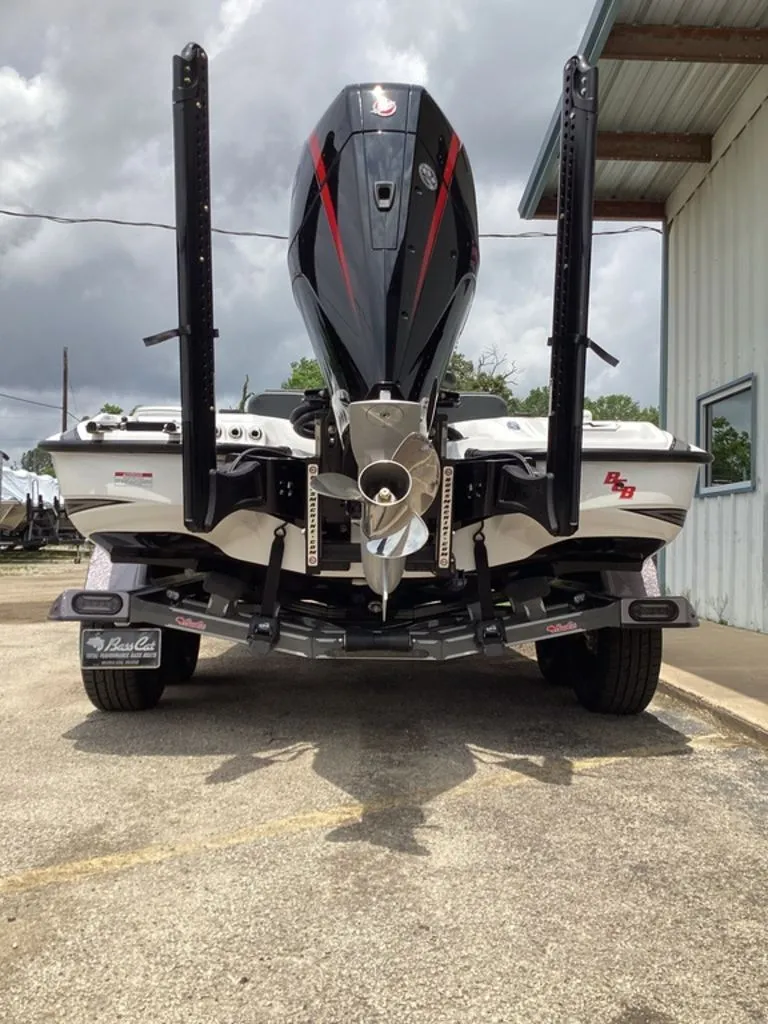 Slide: The Image of 2026 Bass Cat Cougar FTD with powerful outboard motor. - 3