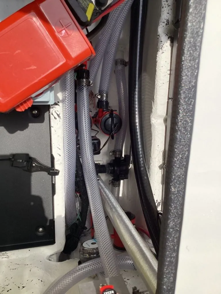 Slide: The Image of Interior view of 2026 Bass Cat Cougar FTD boat with hoses and cables. - 30