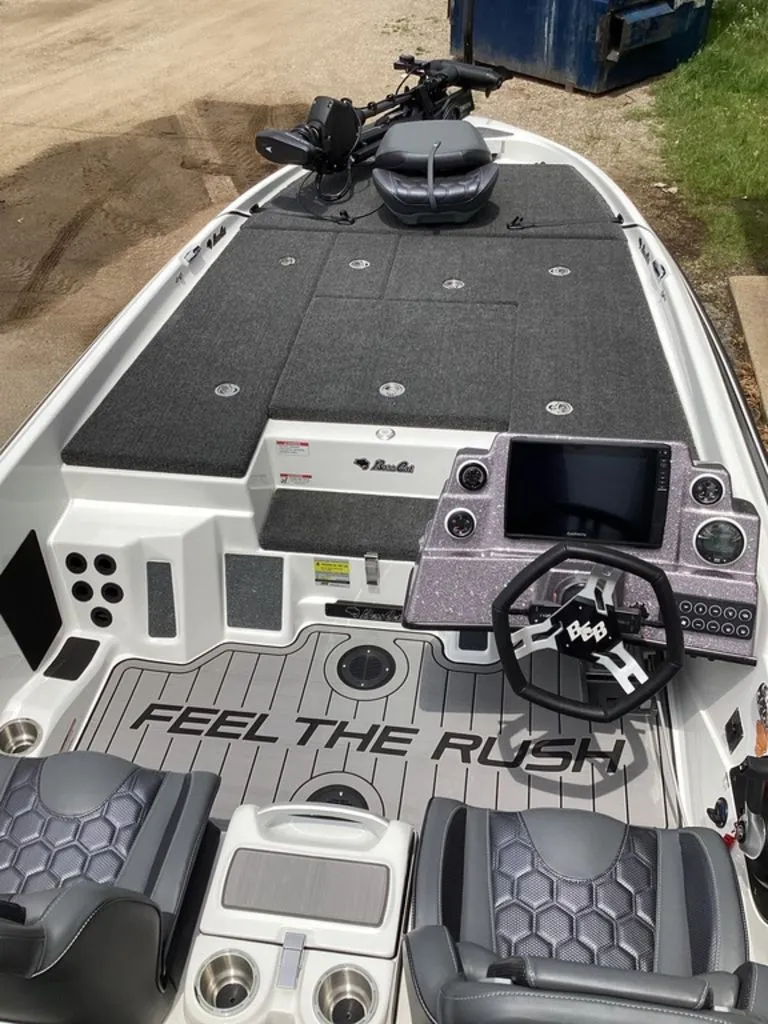 Slide: The Image of Interior view of 2026 Bass Cat Cougar FTD boat with steering console. - 32