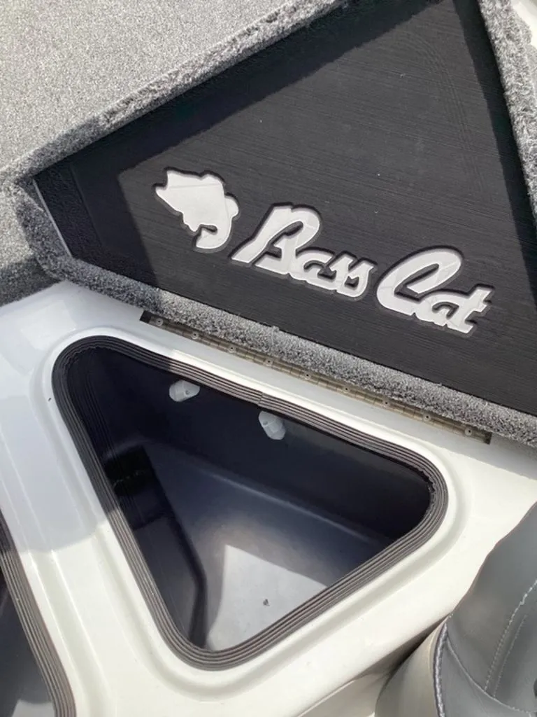 Slide: The Image of Bass Cat Cougar FTD 2026, interior storage compartment view. - 34