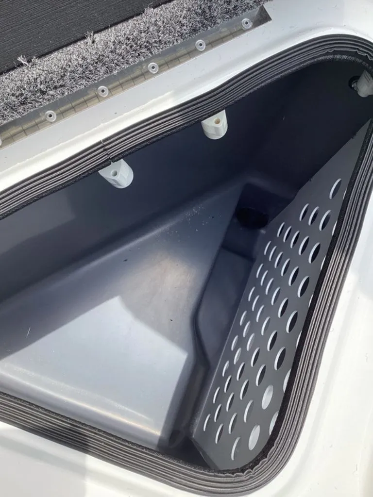 Slide: The Image of Interior view of 2026 Bass Cat Cougar FTD storage compartment. - 37