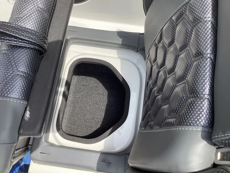 Slide: The Image of Interior of 2026 Bass Cat Cougar FTD with storage compartment. - 38