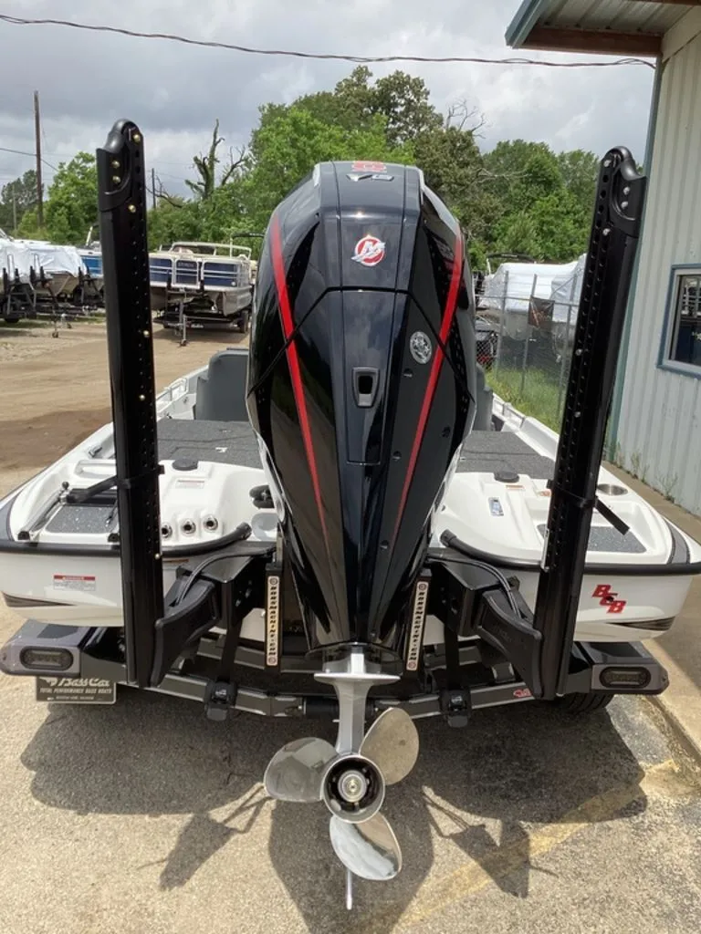 Slide: The Image of 2026 Bass Cat Cougar FTD with powerful outboard motor. - 4