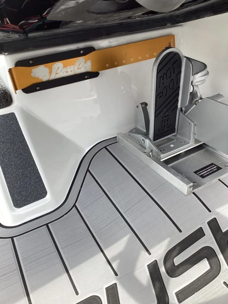 Slide: The Image of Bass Cat Cougar FTD 2026 boat pedal and measuring scale. - 44