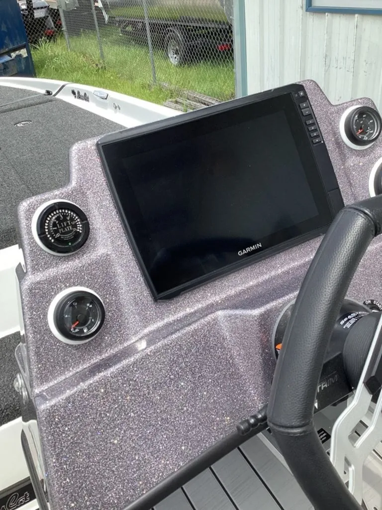 Slide: The Image of 2026 Bass Cat Cougar FTD dashboard with Garmin screen. - 45