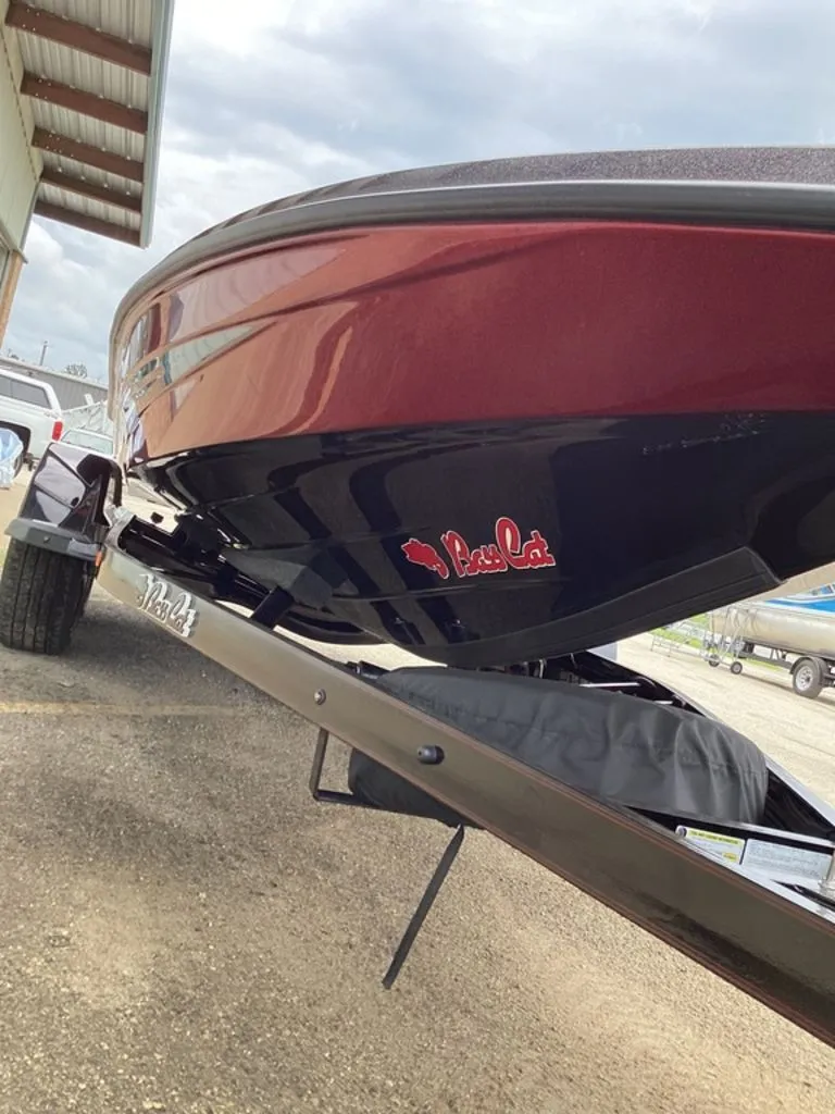 Slide: The Image of 2026 Bass Cat Eyra boat on trailer, close-up of hull. - 21