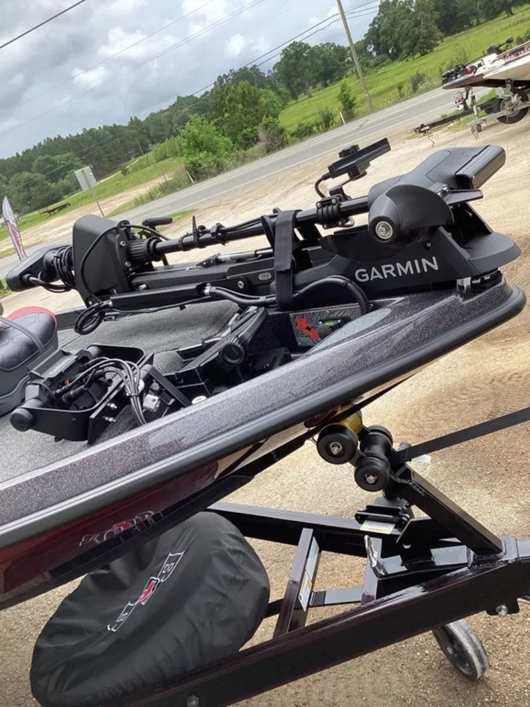 Slide: The Image of 2026 Bass Cat Eyra with Garmin equipment on trailer. - 23