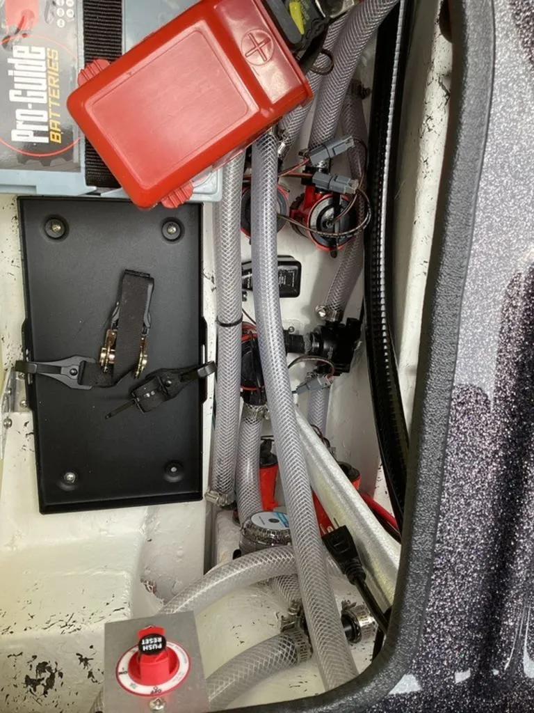 Slide: The Image of Interior view of 2026 Bass Cat Eyra with battery and wiring. - 31