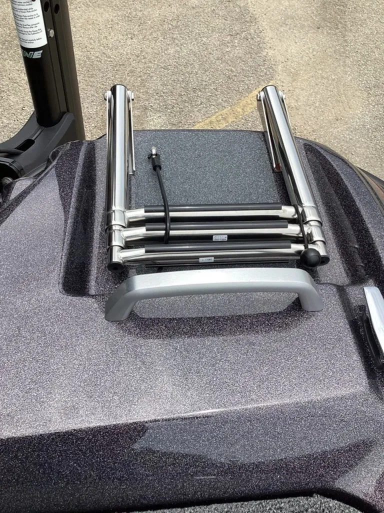 Slide: The Image of 2026 Bass Cat Eyra boat with stainless steel ladder on deck. - 32