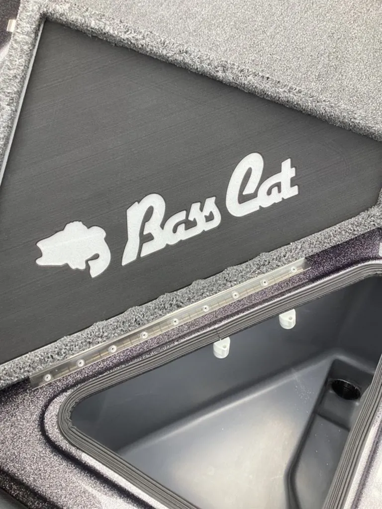 Slide: The Image of Bass Cat Eyra 2026 boat compartment with logo. - 39