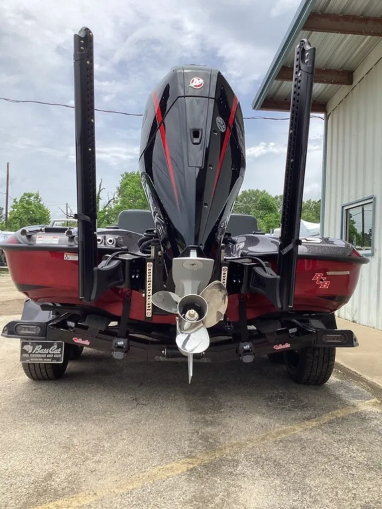 Slide: The Image of Rear view of a 2026 Bass Cat Eyra boat with outboard motor. - 4