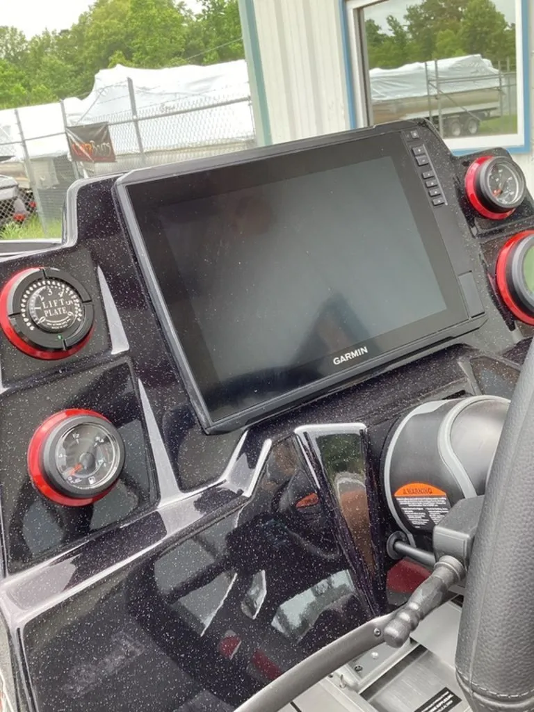 Slide: The Image of Bass Cat Eyra 2026 dashboard with Garmin display. - 49
