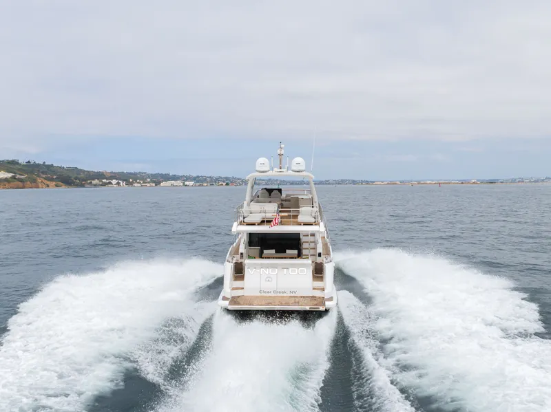 Slide: The Image of 2020 Azimut Fly 60 yacht cruising on open sea. - 10