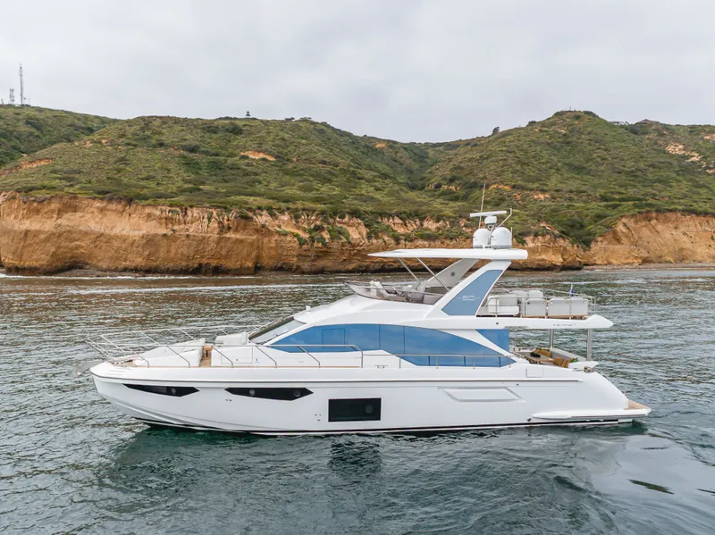 Slide: The Image of Azimut Fly 60 Yacht 2020 near coastal landscape. - 14