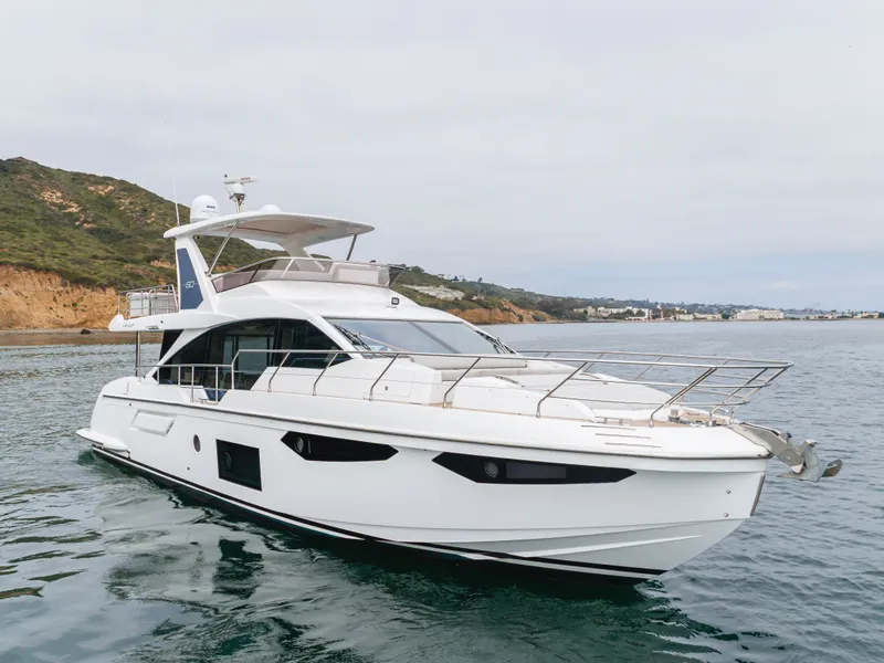 Slide: The Image of Luxury Azimut Fly 60 yacht from 2020 on calm waters. - 15