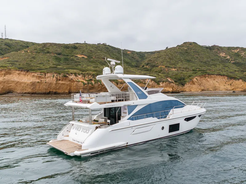 Slide: The Image of Azimut Fly 60 Yacht 2020 near coastal landscape. - 19