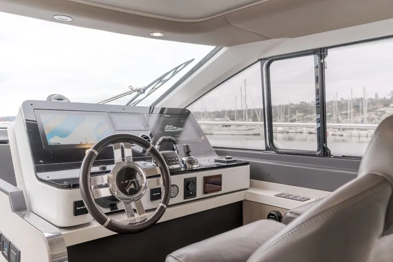 Slide: The Image of Interior view of Azimut Fly 60 yacht helm, model year 2020. - 27