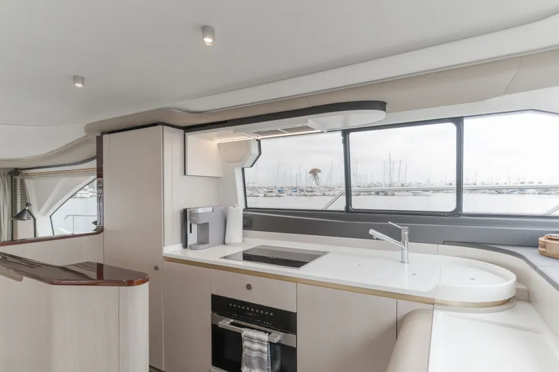 Slide: The Image of Interior of Azimut Fly 60 yacht, modern kitchen with harbor view. - 32