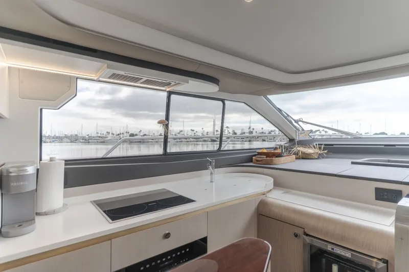 Slide: The Image of Interior of Azimut Fly 60 yacht, modern kitchen with harbor view. - 33