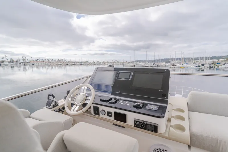 Slide: The Image of Azimut Fly 60 yacht helm, overlooking marina. - 41