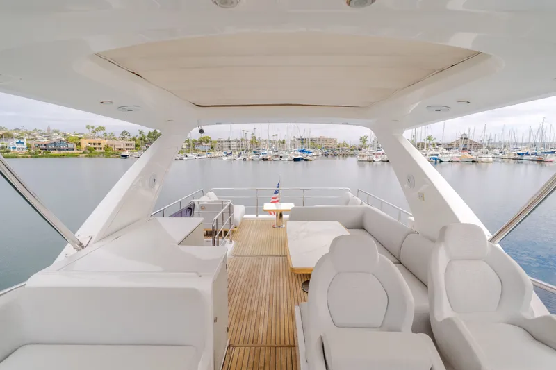 Slide: The Image of Luxurious Azimut Fly 60 yacht deck with harbor view, year 2020. - 42