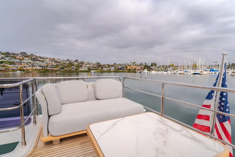Slide: The Image of Azimut Fly 60 yacht with harbor view and American flag. - 43