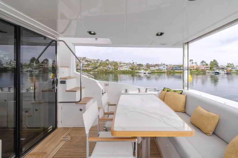 Slide: The Image of Azimut Fly 60 Yacht 2020 with stylish outdoor deck and seating area. - 46