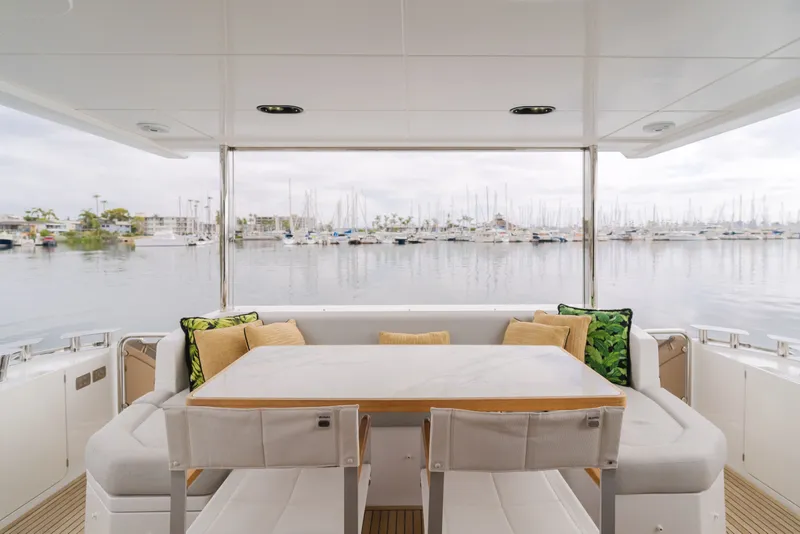 Slide: The Image of Azimut Fly 60 Yacht 2020 with stylish deck area and harbor view. - 47