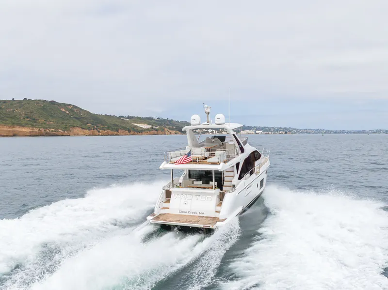 Slide: The Image of 2020 Azimut Fly 60 yacht cruising on open sea. - 9