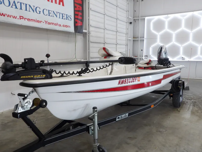 Slide: The Image of 2017 Bass Cat Phelix boat in a showroom. - 3
