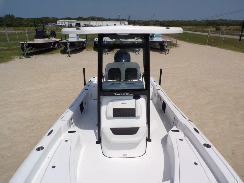 Slide: The Image of 2026 Tidewater 2210 Carolina Bay boat on a parking lot. - 12